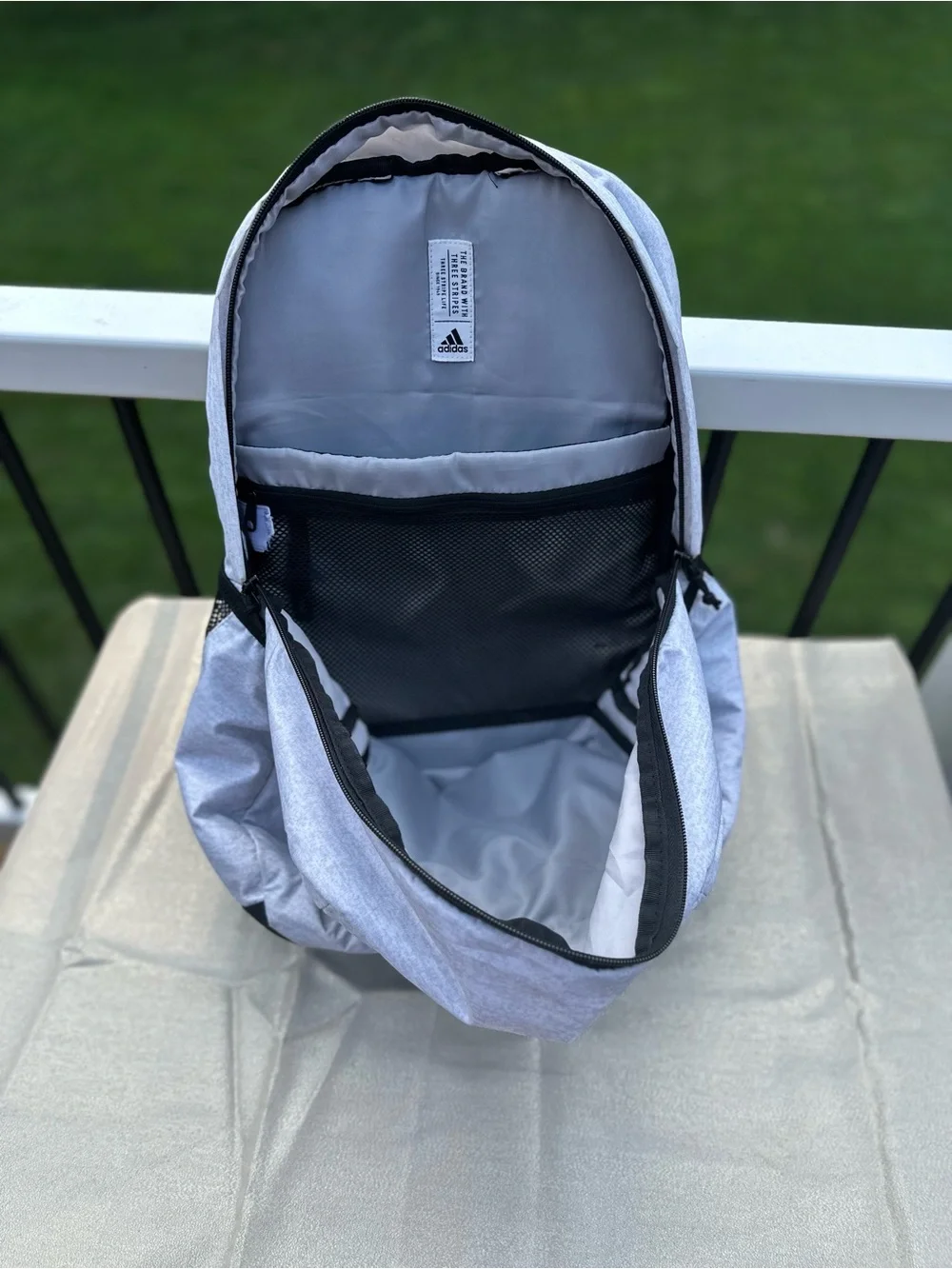 adidas womens Light Gray Backpack with Gold Accents